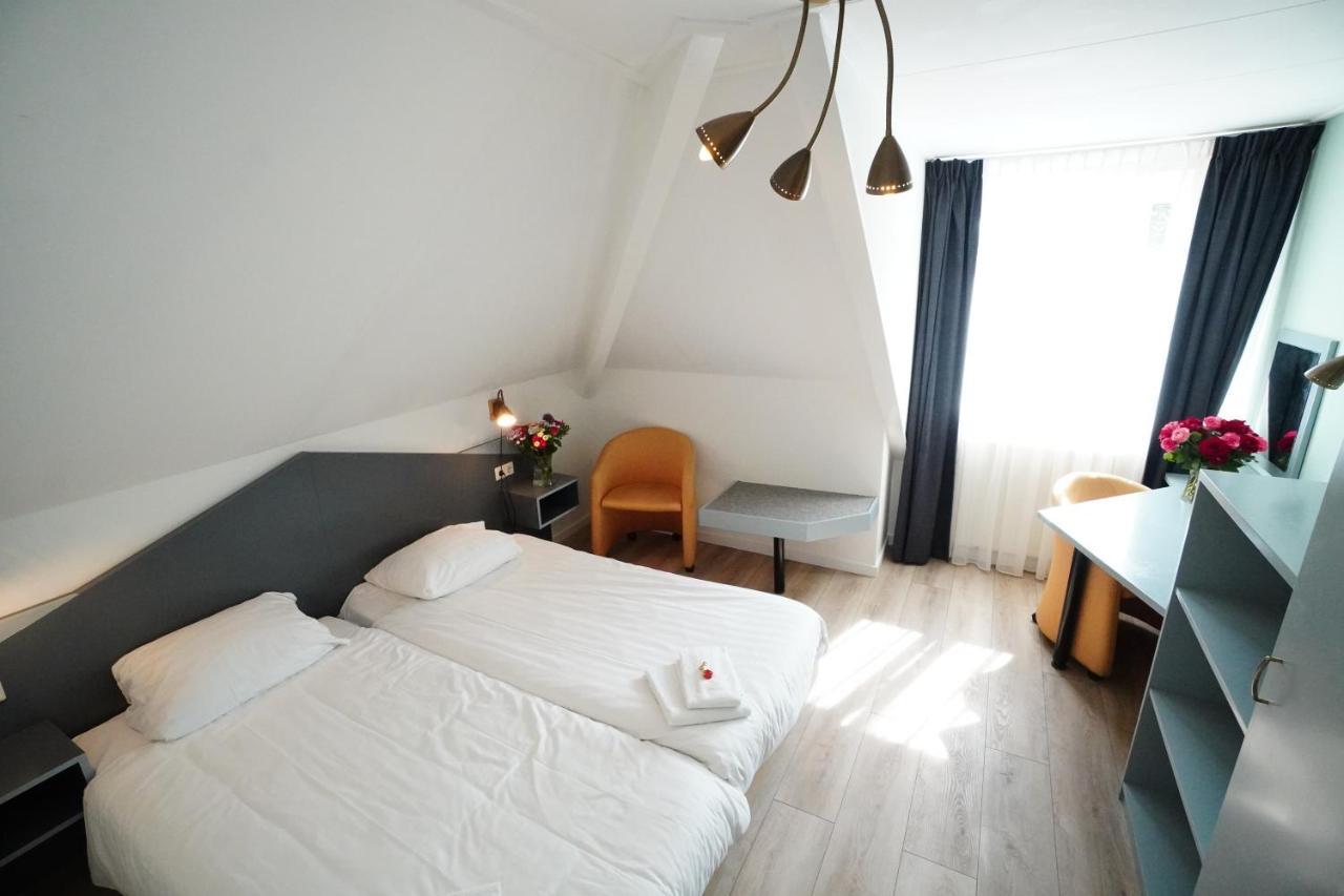 Hotel Den Burg - Digital Access Екстер'єр фото