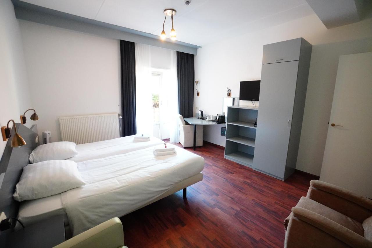 Hotel Den Burg - Digital Access Екстер'єр фото
